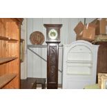 A 19th Century oak grandfather clock with brass di