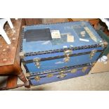 Two metal bound travelling trunks