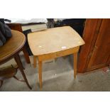 A light oak veneered cutlery table and contents