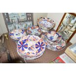 A large quantity of Japanese Imari plates and bowl