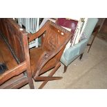 A carved oak Glastonbury type chair
