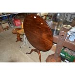 A 19th Century mahogany tilt top tripod table