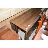 An oak drop leaf table