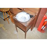 A Georgian mahogany washstand with blue and white