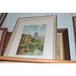 Two framed prints, one depicting an estuary scene