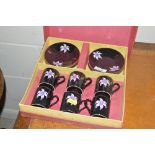 A Palissy "Orchid" patterned coffee set in origina