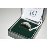 A 9ct gold diamond set ring