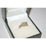 An 18ct gold and diamond three stone set ring