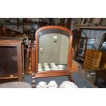 A Victorian style mahogany swing framed mirror