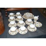 A quantity of Aynsley floral decorated tea cups,