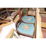 A pair of Victorian style bar back dining chairs