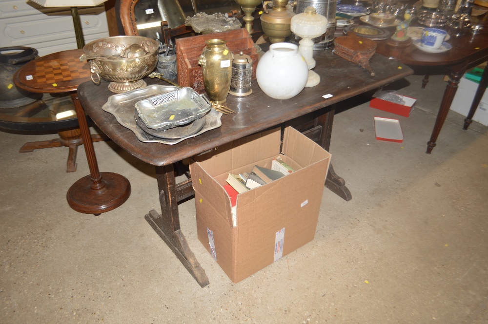 An Ercol dining table; and a set of four ladder ba