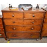 A 19th Century mahogany chest, of two short and three long drawers, raised on turned supports, 107cm