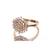 A 9ct gold diamond cluster ring size "L"