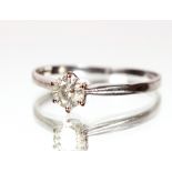 An 18ct white gold solitaire diamond ring, set with approx. ½ carat diamond, size "W", band worn