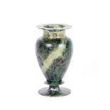 A green hard stone baluster vase, of spinach colour, 22.5cm high