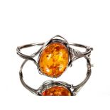 A silver and amber bracelet