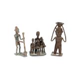 An antique African bronze figure, of a female pounding a pestle and mortar, Yoruba, 14.5cm high; and