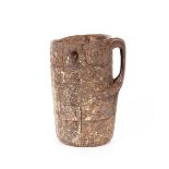 A late 17th early 18th Century wooden Nepalese beer tankard, 28cm