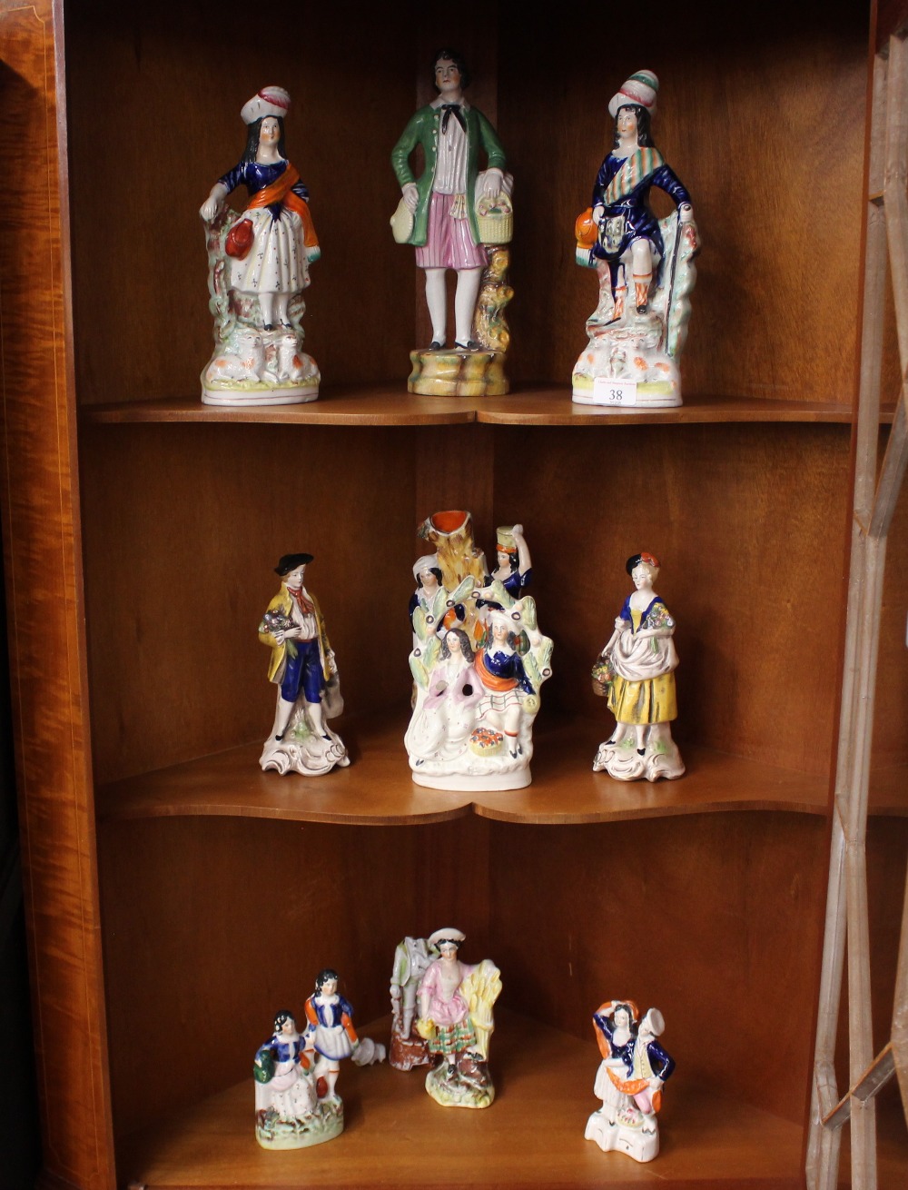 A collection of various Victorian Staffordshire and other figures (some damage)