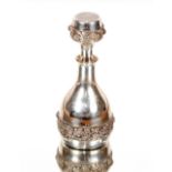 A silver flask and stopper, by Mappin & Webb, having raised vine banded decoration, London1978, 14cm