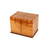 An Art Deco walnut trinket box, the radially veneered hinged top inset to the interior with a