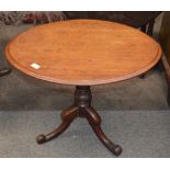 A 19th Century oval mahogany occasional table, raised on turned column and tripod base, the top 70cm