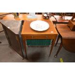 A 19th Century mahogany satin wood cross banded and strung work table, having pull up back screen