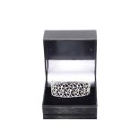 An 18ct white gold and diamond hinged cuff bracelet, marked G750, diamonds 3.737 carat, 33gms