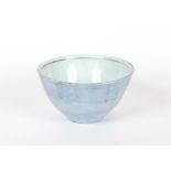 Style of Bernard Leach, a Studio Pottery bowl, the interior decorated with deer, pale blue with