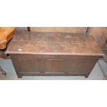 An antique oak coffer, having triple panel front, raised on square section supports, 133cm