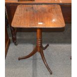 A 19th Century mahogany rectangular topped occasional table, raised on turned baluster column and