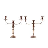 A pair of 19th Century plate on copper three light candelabra, having gadroon border decoration