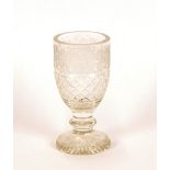 A 19th Century cut glass goblet, having hobnail ce