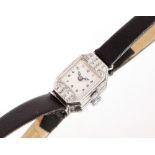 An 18ct white gold and diamond set cocktail watch, approx. 5gms