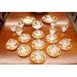 A Chamberlain Worcester tea set, comprising tea cups, coffee cups and saucers, slops bowl, and a