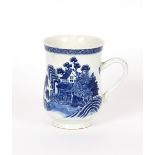 A Lowestoft blue and white baluster tankard, decorated with Chinese river scene, 16cm high
