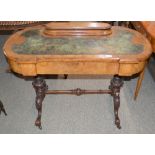 A Victorian walnut writing table, having leather inset top, hinged stationery compartment, single