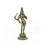 An Indian bronzed figure, of a goddess raised on circular plinth base, 33xm high