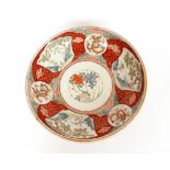A large Imari shallow dish, decorated in traditional palette, six character mark to base, 37cm dia.