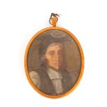 An 18th Century miniature portrait of a cleric, contained in pendant frame; a 19th Century