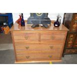 An Edwardian Maple & Co. satin birch chest, of two short and two long drawers, 105cm wide