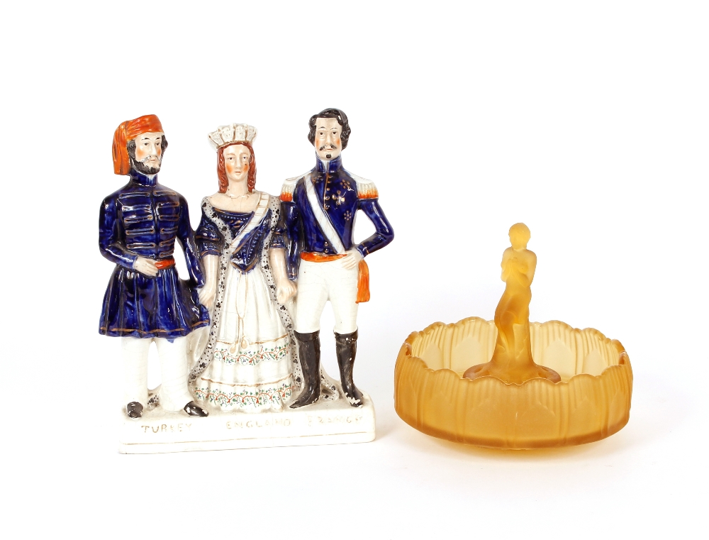 A Staffordshire figure group, "Turkey, England and France", 22cm long x 29cm high; and an Art Deco