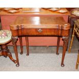A George III mahogany triple fold over tea / card table, with inlaid chequerboard interior and