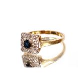 An 18ct gold sapphire and diamond ring, size "M½"