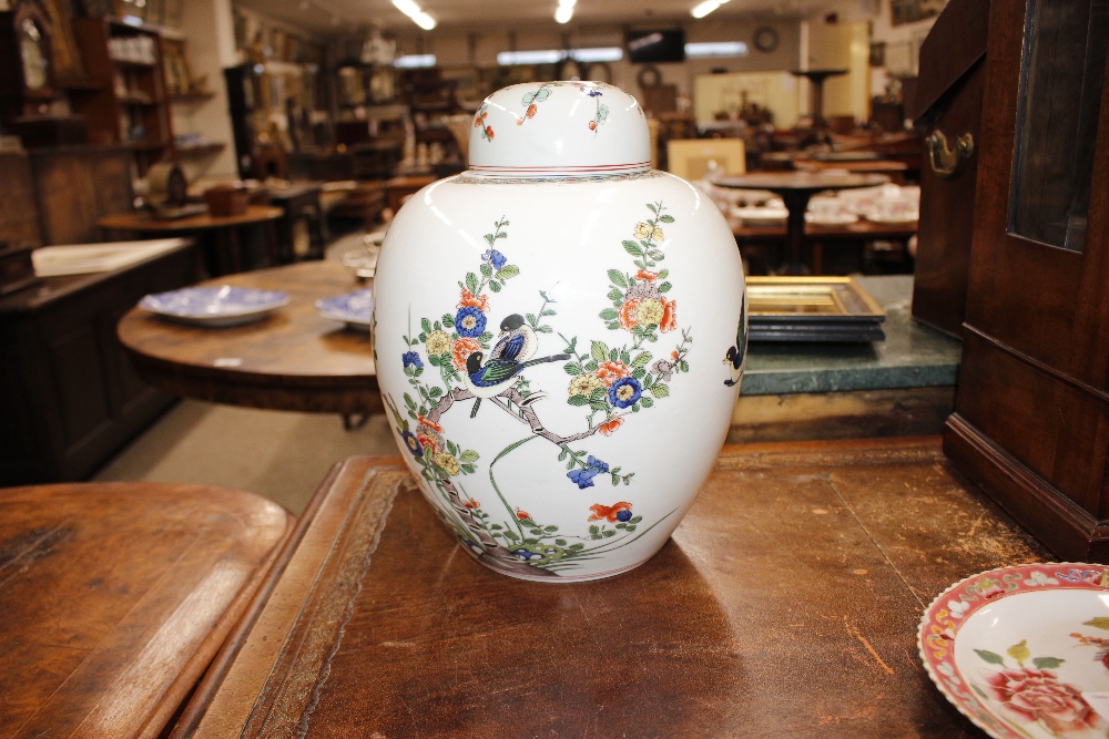 A pair of Chinese ginger jars and covers, having floral and bird decoration, 31cm high - Image 12 of 17