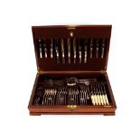 A Walnut cross banded case of plated cutlery, by Mappin & Webb
