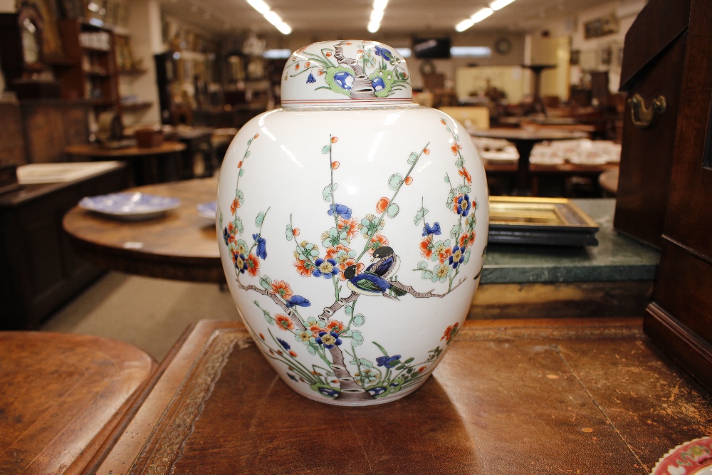 A pair of Chinese ginger jars and covers, having floral and bird decoration, 31cm high - Image 10 of 17