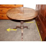 A 19th Century mahogany tilt top tea table, raised on turned column and tripod base, 80cm dia.