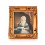 English school circa. 1810, portrait of a seated lady, unsigned watercolour in original gilt